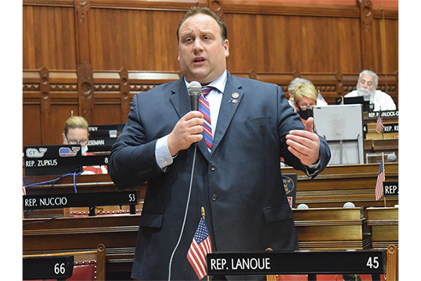 Brian Lanoue speaking on house floor in support of his background check bill.