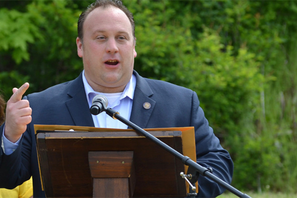  Brian Lanoue speaking at opening ceremonies for Voluntown's tricentenial celebration.